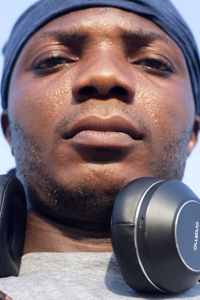 nigeria, man, portrait, headphones, outdoors
